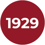 maroon circle with 1929 in white in the center